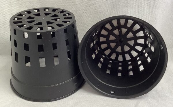 two black plastic pots with holes around