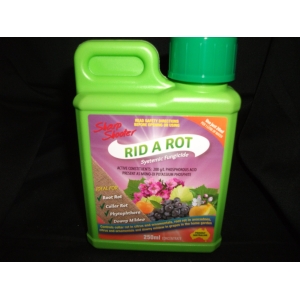 a small jug of rid and rot fungicide